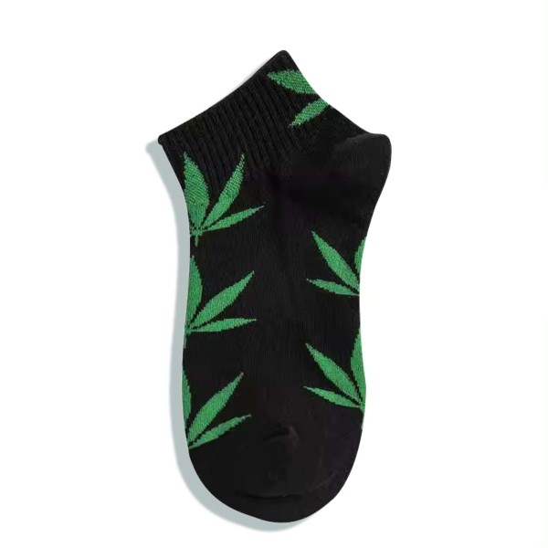 Chaussettes noires avec feuilles de cannabis vertes